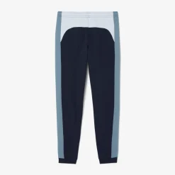 Trainingshose mit zulaufenden Beinen und Colorblock-Design